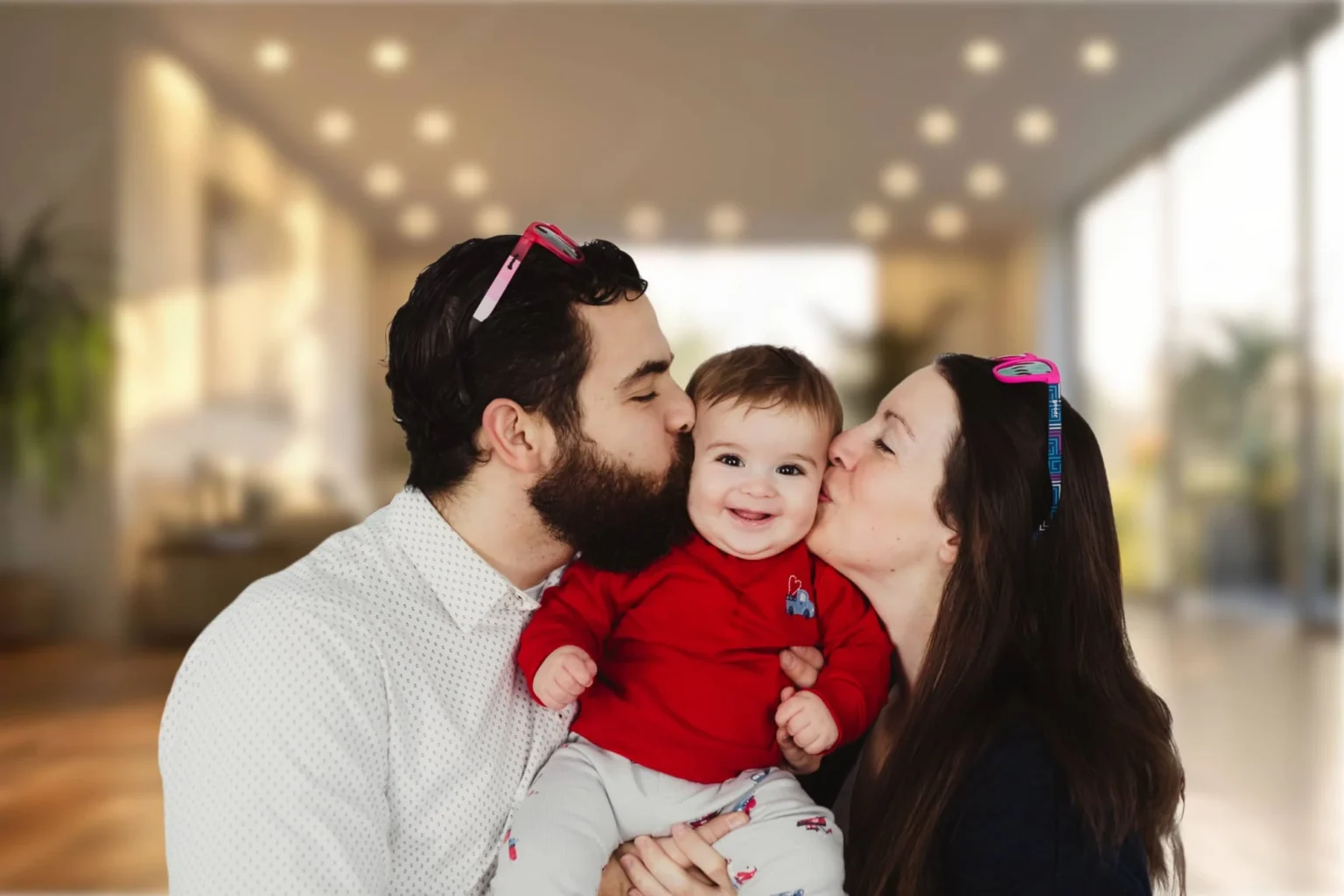 Chris Hodges with his wife and son
